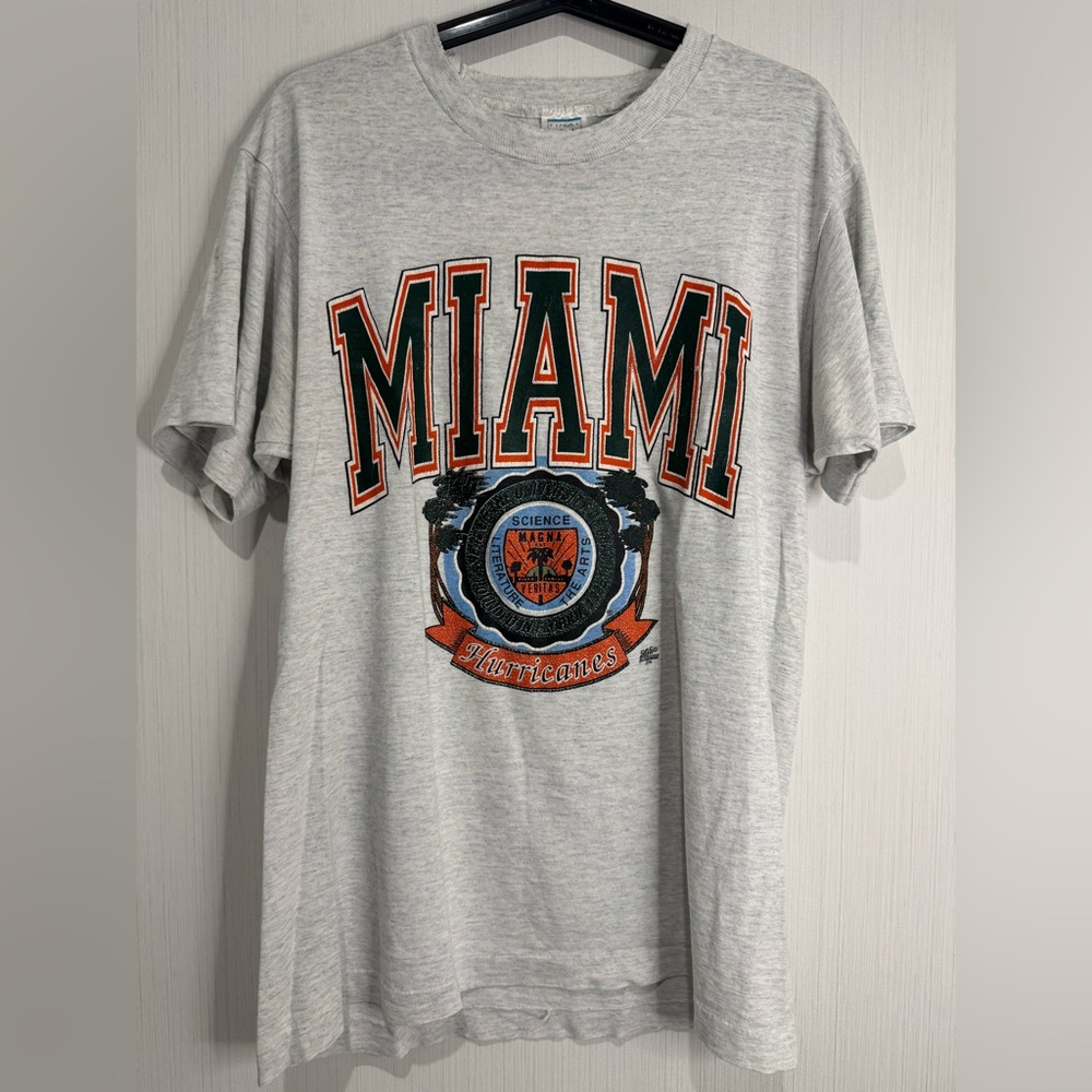 Vintage 1990s Miami Hurricanes Tee. M/L. Light Grey. Final Play. SOS Enterprises